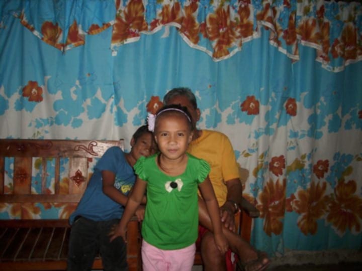 Nicolai with her brother and lolo